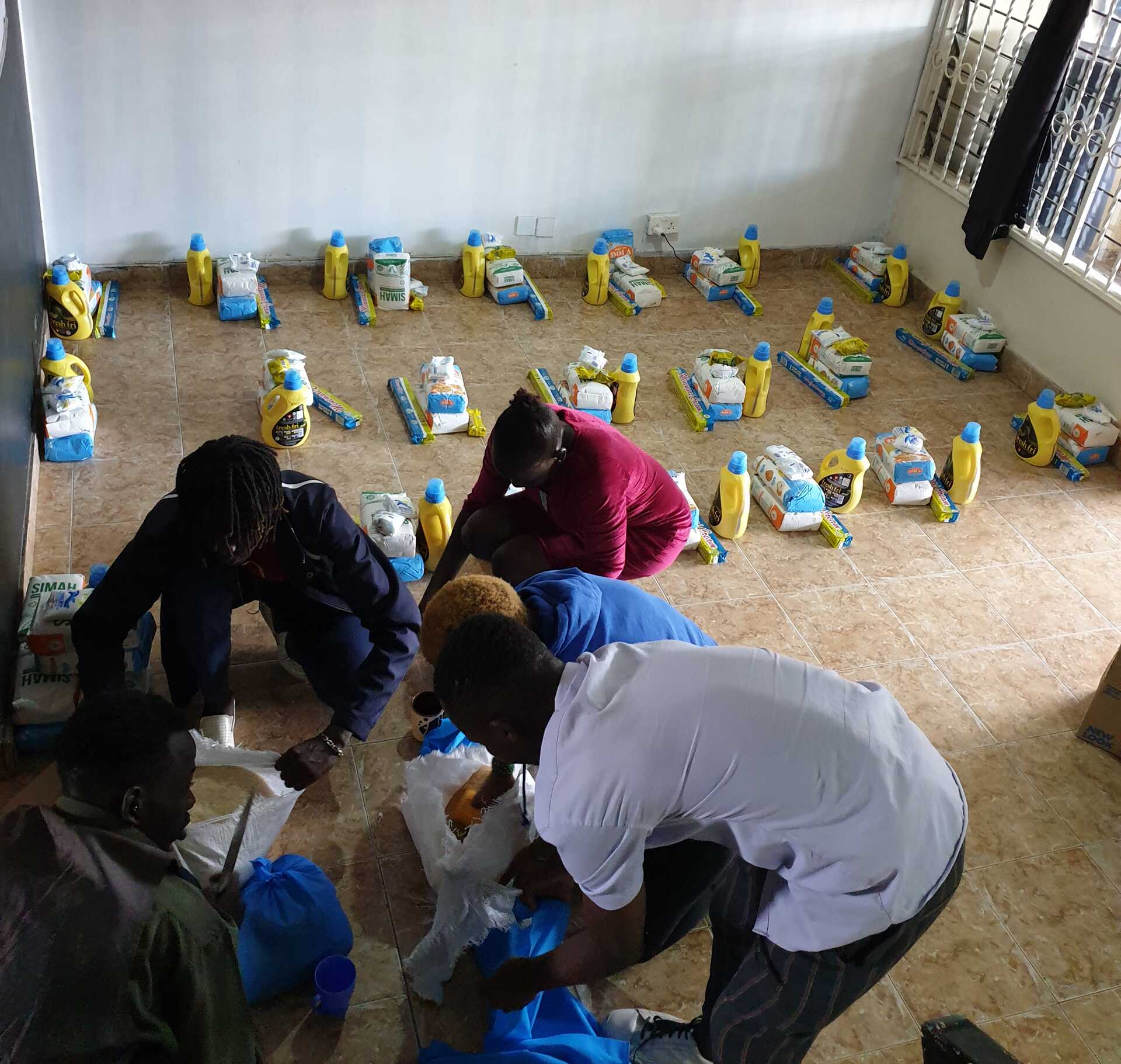 Volunteers packing food